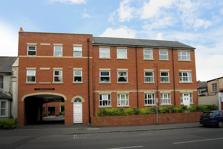 A modern yet traditional red brick building
