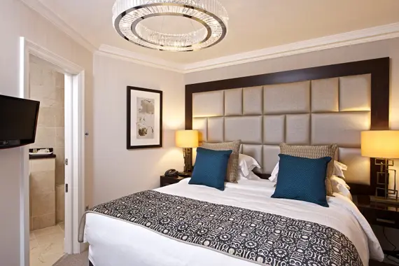 An opulent bedroom at Fraser Suites Kensington