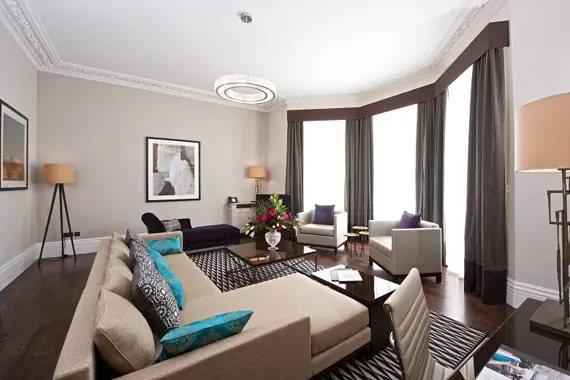 The spacious, light living space in a three bedroom apartment