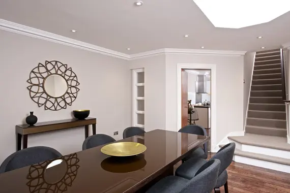 A light dining space in a three bedroom apartment