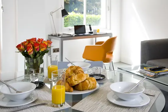 A lovely dining space with modern utencils