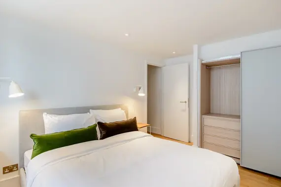 Master bedroom with built in wardrobes