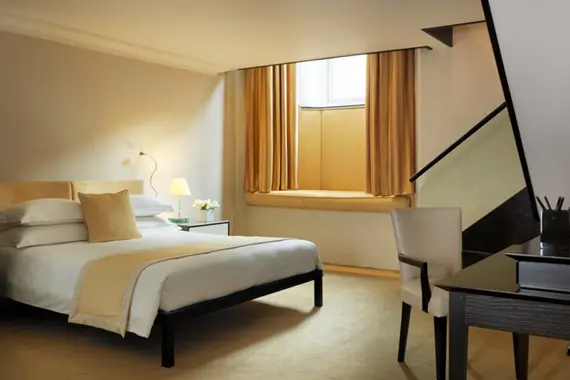 A spacious and light bedroom at Cheval Phoenix House