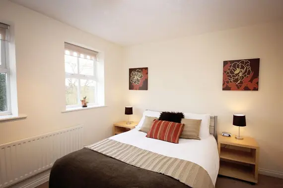 Neutral coloured  double bedroom