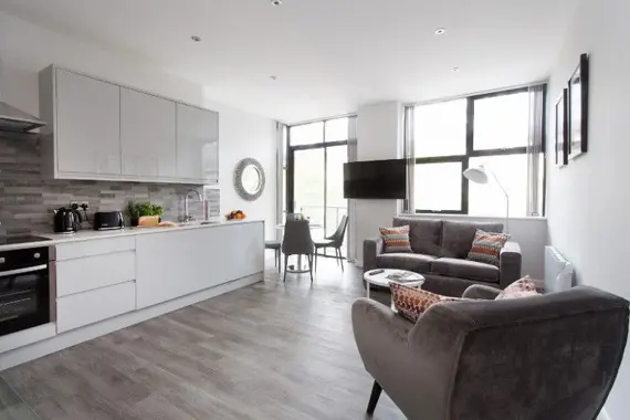 An open plan kitchen and lounge area