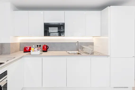 A fully equipped kitchen fitted with modern appliances