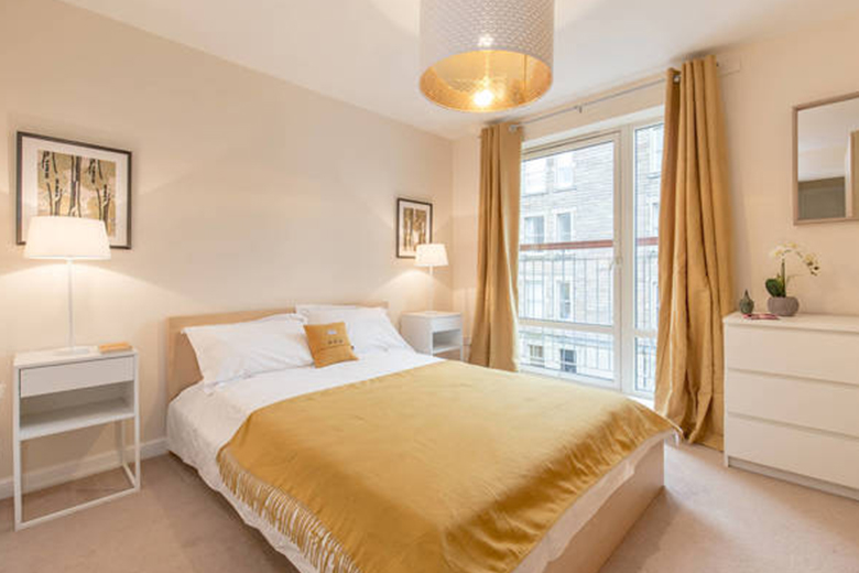 A stylish and golden bedroom apartment