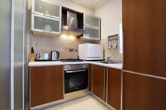 A fully equipped kitchen in Chesham Court