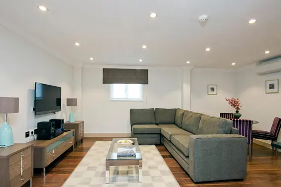 A relaxing, homely living space in an executive one bedroom