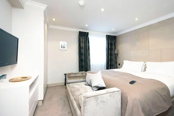 Neutral colours throughout this executive one bedroom apartment.