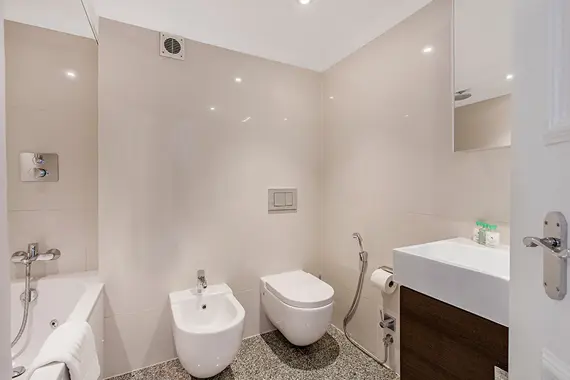A spacious bathroom in a one bedroom standard apartment