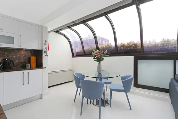 Large and beautiful windows in a four bedroom apartment