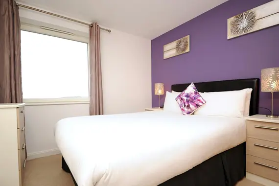 A purple Silver standard bedroom apartment