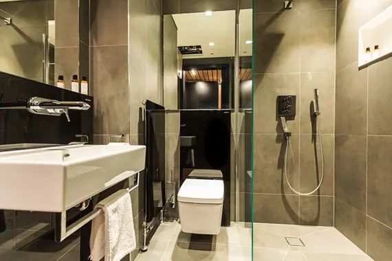 A spacious bathroom in a studio apartment