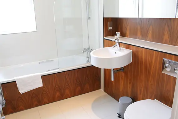 A polished and clean shower over bath