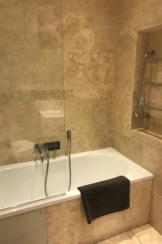 Relax and unwind in this spacious bathroom