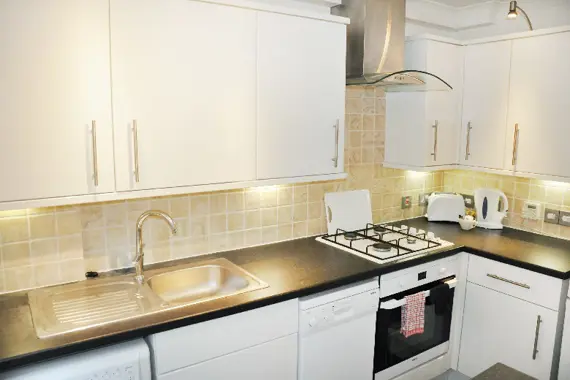 A fully equipped kitchen in the studio units