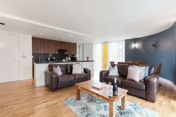 A spacious living area in Sinclair Apartments