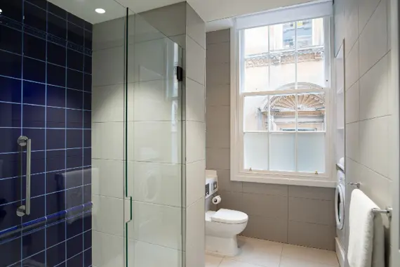 A standard one bedroom spacious bathroom