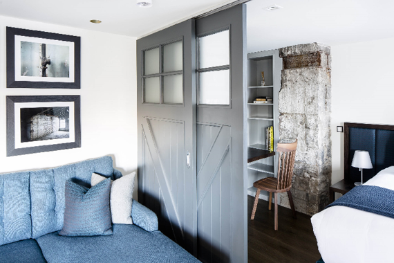 Living area / bedroom in a spacious Deluxe One Bedroom