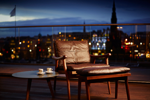 Enjoy some fresh air on your balcony in the Deluxe Two Bedroom