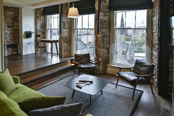 A stunning living room with beautiful floor to ceiling windows