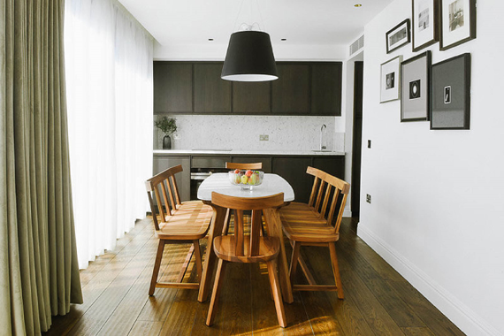 A lovely dining and kitchen area in the Deluxe One Bedroom