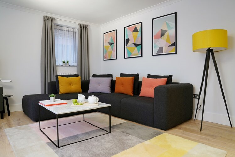 The bright lounge of a two bedroom apartment at Monarch House