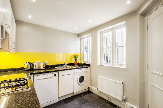 A floral relaxing lounge area in one of the one bedroom apartmnets