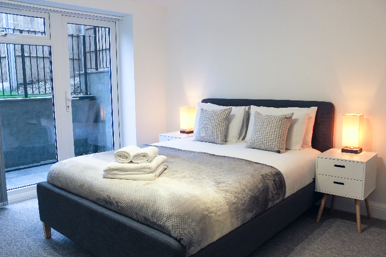 A comfortable bedroom with plenty of light