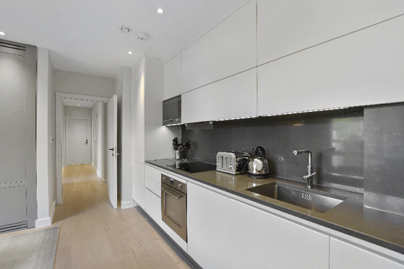 A fully equipped kitchen in the two bedroom apartments