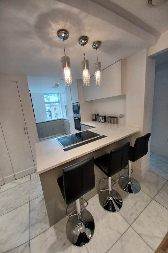 A fully equipped kitchen in the three bedroom apartments