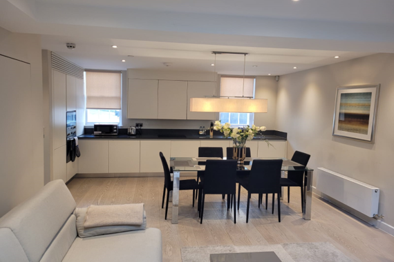 A spacious open plan kitchen in the three bedroom apartments