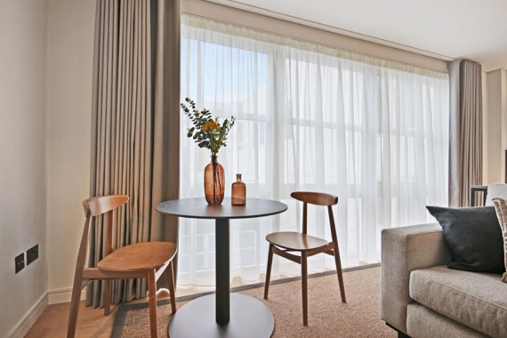 a spacious and comfy studio bedroom