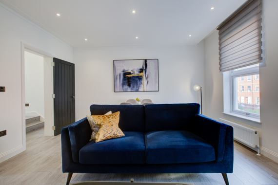 Modern and airy living room, filled with natural light and stylish decor