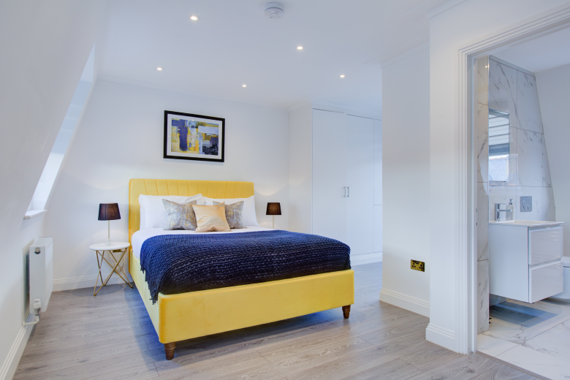 Retreat to a stylish and elegant bedroom, adorned with elegant touches and a soothing color palette.