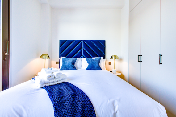 Comfortable and bright bedroom with ample storage