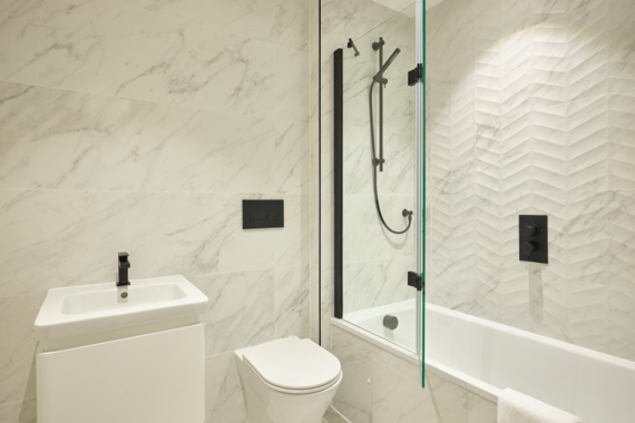 Spacious bathroom with a lovely bathtub for a relaxing experience