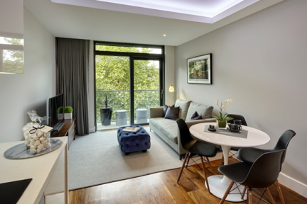 Step into the bright and spacious living area, filled with natural light and a refreshing sense of openness