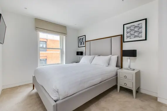 A spacious and well-appointed bedroom