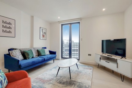 Modern and airy living room, filled with natural light and stylish decor