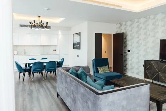 Step into the bright and spacious living area, filled with natural light and a refreshing sense of openness