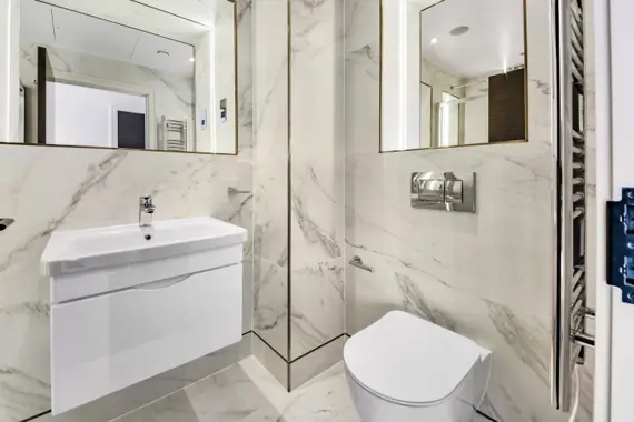 Sparkling shower room with modern fixtures and a clean, fresh feel.