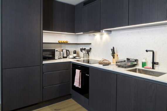 Modern, fully equipped kitchen with a sleek and stylish finish
