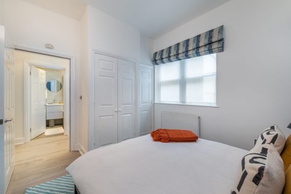 Retreat to a cozy and stylish bedroom