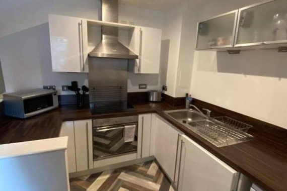 Fully equipped kitchen with appliances 