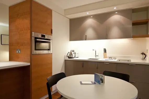 A trendy, modern kitchen and dining area at Turnmill Street