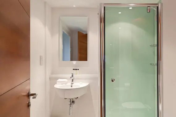 A sleek, bright and modern shower room at Turnmill Street