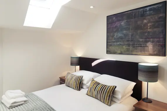 A comfortable, modern double bedroom