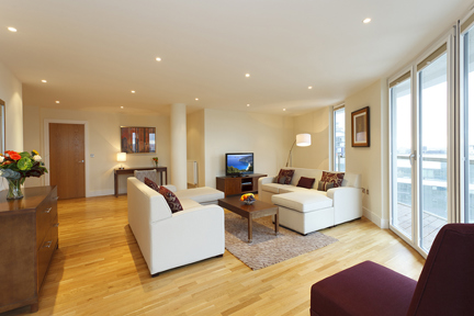 A spacious and modern lounge at Trinity Tower Apartments